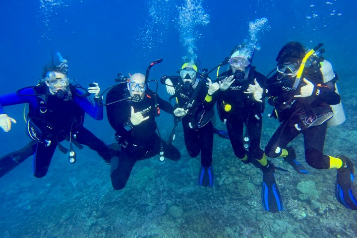 a group of people posing for the camera
