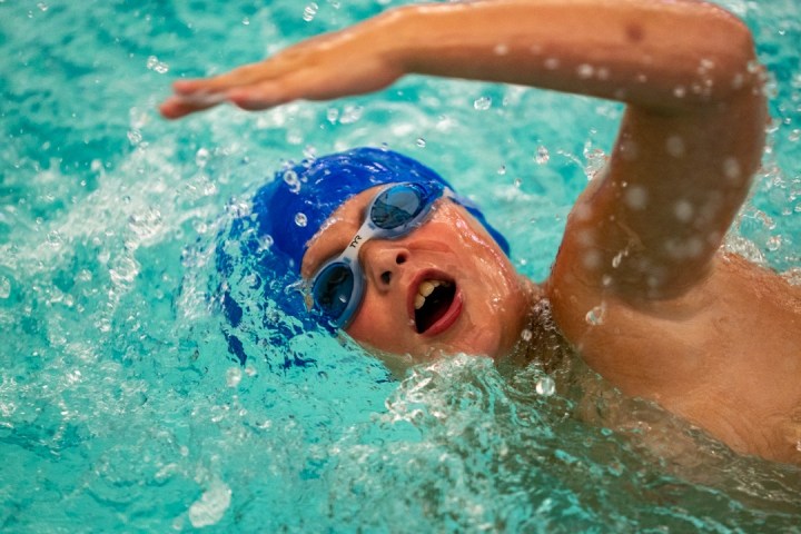 a person swimming in the water