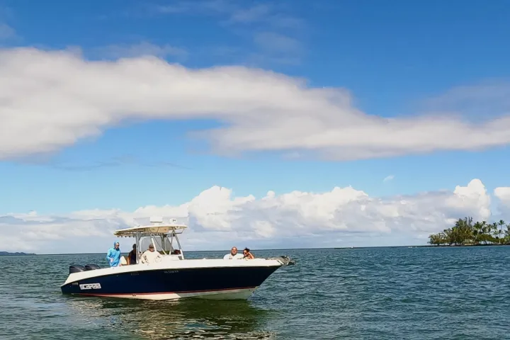 a small boat in a large body of water