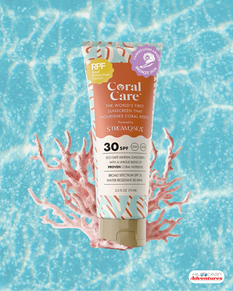 Tube of Coral Care sunscreen with coral background and blue water.