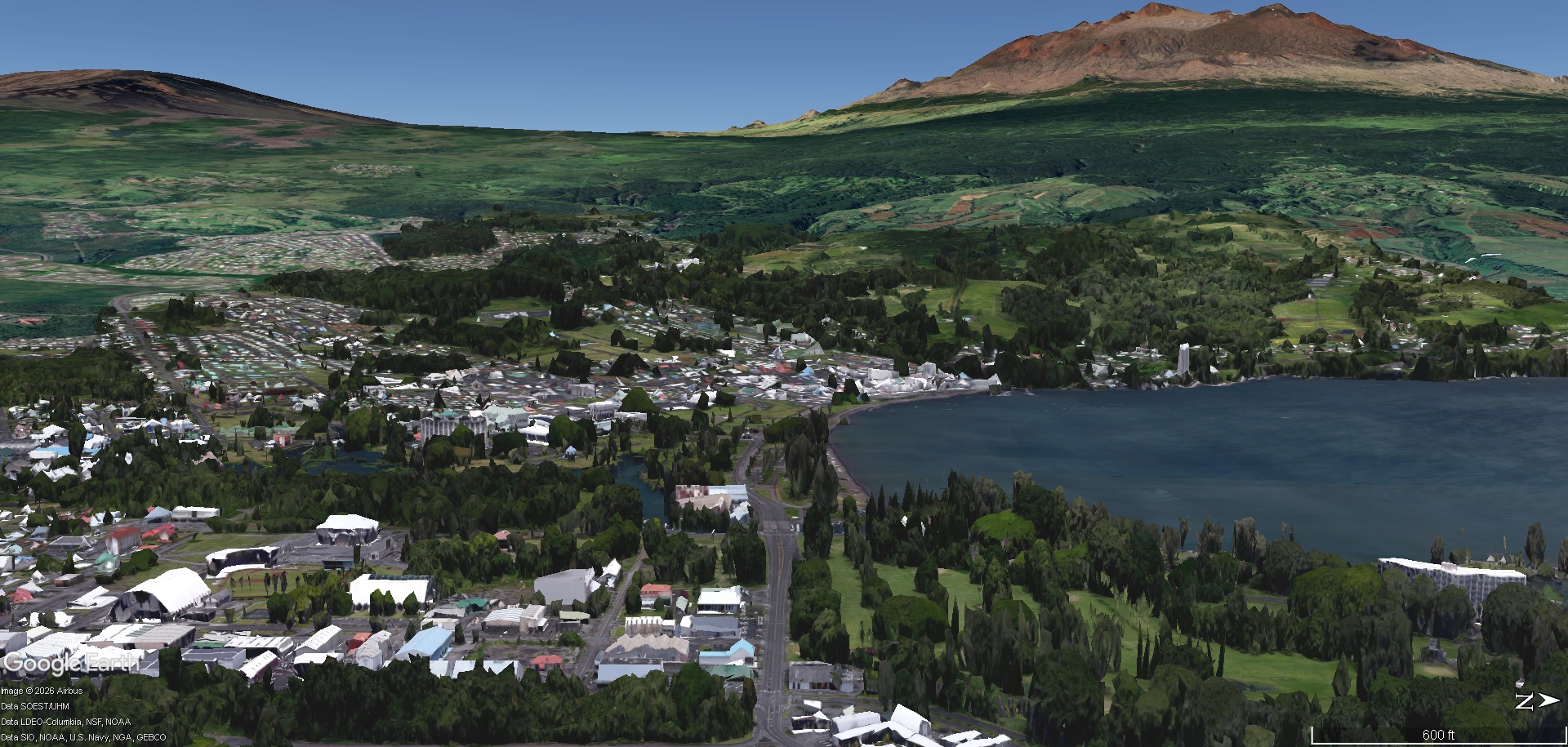 3D view of Hilo Bay and town with Mauna Loa and Mauna Kea rising behind, elevation exaggerated